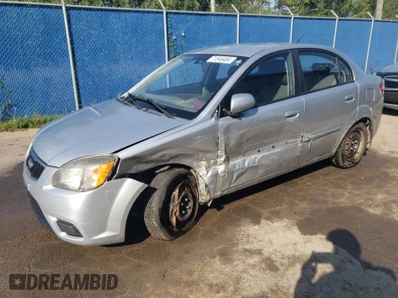 2011 Kia Rio with VIN KNADH4B32B6915275, listed as a Copart auction lot 71546484 with 297,998 mi miles and Salvage Title. Bid and sale history available at DreamBid. Image 1.