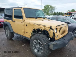 2014 Jeep Wrangler Rubicon with VIN 1C4BJWCG4EL145081, listed as a IAAI auction lot 42180723 with 113,659 mi miles and . Bid and sale history available at DreamBid. Image 1.