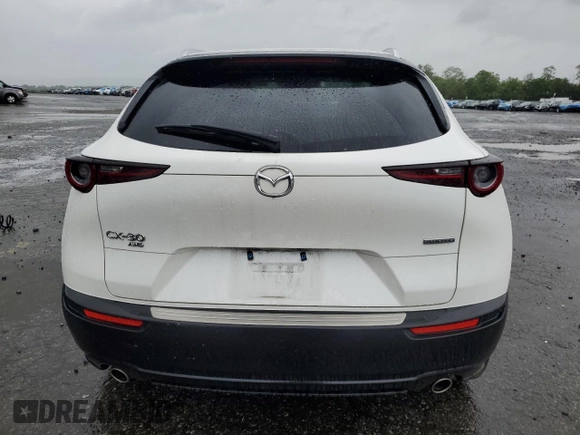 2023 Mazda CX-30 S Select z VIN 3MVDMBBM8PM573462, wystawiony jako Copart lot #58017345 z przebiegiem 42 706 mil mil oraz Szkoda całkowita • Salvage title. Historia ofert i sprzedaży dostępna na DreamBid. Obrazek 6.