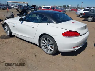 2011 BMW Z4 sDrive35i with VIN WBALM7C55BE383700, listed as a IAAI auction lot 41852272 with 101,562 mi miles. Bid and sale history available at carsss.com. Image 3.
