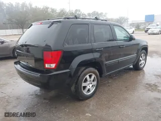 2009 Jeep Grand Cherokee Laredo with VIN 1J8GS48K39C549136, listed as a IAAI auction lot 41446925 with 162,639 mi miles. Bid and sale history available at carsss.com. Image 4.