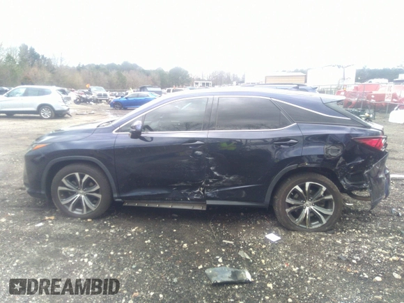 2017 Lexus RX with VIN 2T2ZZMCA4HC060546, listed as a IAAI auction lot 41734868 with 119,000 mi miles. Bid and sale history available at carsss.com. Image 14.