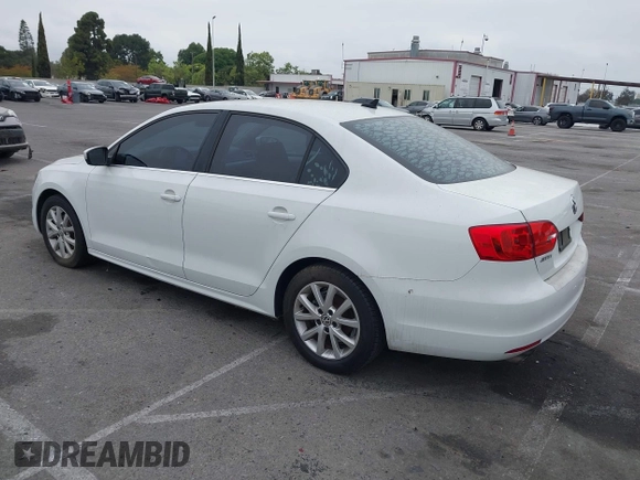 2014 Volkswagen Jetta Sedan SE w/Connectivity/Sunroof PZEV with VIN 3VWD17AJ6EM420961, listed as a IAAI auction lot 42107575 with 198,329 mi miles. Bid and sale history available at carsss.com. Image 3.