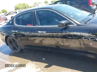 2006 Maserati Quattroporte z VIN ZAMCE39A660024352, wystawiony jako IAAI lot #42050460 z przebiegiem 57 715 mil mil oraz . Historia ofert i sprzedaży dostępna na DreamBid. Obrazek 13.