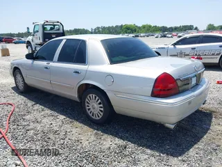 2008 Mercury Grand Marquis GS z VIN 2MEFM74V68X613992, wystawiony jako IAAI lot #42278288 z przebiegiem 177 454 mil mil oraz . Historia ofert i sprzedaży dostępna na DreamBid. Obrazek 3.