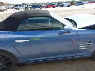 2008 Chrysler Crossfire Limited z VIN 1C3LN65L68X075247, wystawiony jako IAAI lot #42269911 z przebiegiem 107 025 mil mil oraz . Historia ofert i sprzedaży dostępna na DreamBid. Obrazek 13.