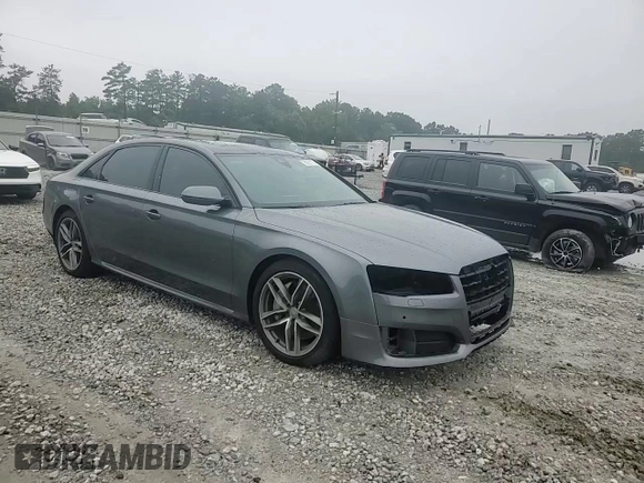 2017 Audi A8 с VIN WAU44AFD3HN017828, выставлен на аукционе Copart как лот 58053175 с пробегом 59 972 миль миль и Списание • Salvage title. История ставок и продаж доступна на DreamBid. Изображение 14.