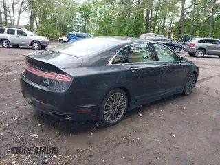 2013 Lincoln MKZ with VIN 3LN6L2J98DR817275, listed as a IAAI auction lot 42196186 with 128,456 mi miles. Bid and sale history available at carsss.com. Image 4.