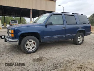 1998 GMC Yukon with VIN 1GKEK13R5WR514208, listed as a Copart auction lot 49724615 with 260,788 mi miles and Salvage Title. Bid and sale history available at carsss.com. Image 1.