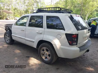 2005 Jeep Grand Cherokee Limited with VIN 1J8HR58225C639457, listed as a IAAI auction lot 42431008 with 126,437 mi miles and . Bid and sale history available at DreamBid. Image 3.