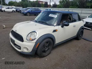 2013 MINI Hardtop with VIN WMWSU3C51DT374477, listed as a Copart auction lot 62654295 with 127,295 mi miles and Salvage title. Bid and sale history available at DreamBid. Image 1.