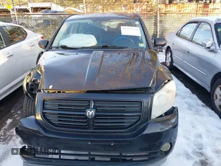 2009 Dodge Caliber SXT with VIN 1B3HB48A89D118869, listed as a IAAI auction lot 41315552 with 198,986 mi miles and . Bid and sale history available at DreamBid. Image 12.