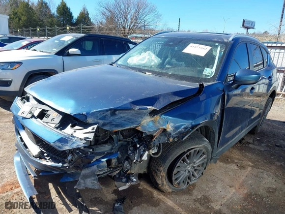 2019 Mazda CX-5 Touring with VIN JM3KFACM7K1654347, listed as a IAAI auction lot 41473542 with 101,297 mi miles. Bid and sale history available at carsss.com. Image 14.