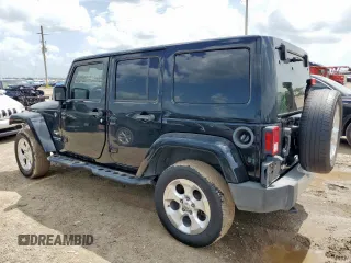 2015 Jeep Wrangler Unlimited Sahara with VIN 1C4BJWEG4FL668339, listed as a Copart auction lot 61221325 with 117,887 mi miles and Salvage title. Bid and sale history available at DreamBid. Image 2.