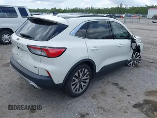 2020 Ford Escape Titanium Hybrid with VIN 1FMCU0DZ3LUC07842, listed as a IAAI auction lot 42456359 with 62,756 mi miles and . Bid and sale history available at DreamBid. Image 4.