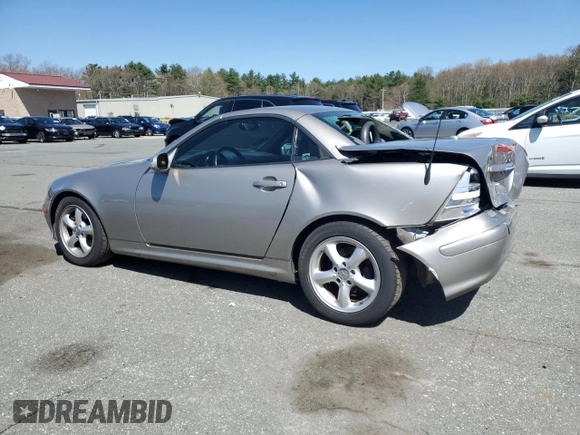 2003 Mercedes-Benz SLK 320 with VIN WDBKK65F33F286090, listed as a Copart auction lot 54711385 with 82,300 mi miles and Salvage title. Bid and sale history available at DreamBid. Image 2.
