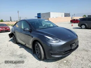 2024 Tesla Model Y Long Range z VIN 7SAYGDEE3RF121102, wystawiony jako Copart lot #60548895 z przebiegiem 13 336 mil mil oraz Szkoda całkowita • Salvage title. Historia ofert i sprzedaży dostępna na DreamBid. Obrazek 14.