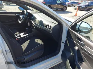 2023 Volkswagen Jetta Sport z VIN 3VWBM7BU2PM034287, wystawiony jako IAAI lot #41742935 z przebiegiem 32 818 mil mil oraz . Historia ofert i sprzedaży dostępna na DreamBid. Obrazek 5.