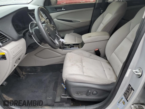 2017 Hyundai Tucson SE z VIN KM8J33A48HU278031, wystawiony jako Copart lot #49918545 z przebiegiem 125 382 mil mil oraz Szkoda całkowita • Salvage title. Historia ofert i sprzedaży dostępna na DreamBid. Obrazek 7.
