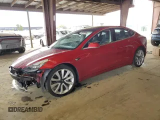 2018 Tesla Model 3 Long Range Battery z VIN 5YJ3E1EB3JF091637, wystawiony jako Copart lot #52127795 z przebiegiem 69 145 mil mil oraz Szkody całkowita. Historia ofert i sprzedaży dostępna na DreamBid. Obrazek 1.