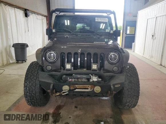 2013 Jeep Wrangler Unlimited Sahara with VIN 1C4HJWEG0DL658138, listed as a Copart auction lot 63792855 with Not provided miles and Clean title. Bid and sale history available at DreamBid. Image 5.