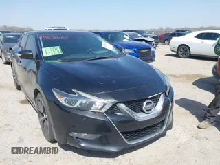 2016 Nissan Maxima SV z VIN 1N4AA6APXGC414644, wystawiony jako IAAI lot #41825222 z przebiegiem 128 049 mil mil oraz . Historia ofert i sprzedaży dostępna na DreamBid. Obrazek 1.
