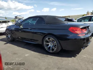 2013 BMW M6 z VIN WBSLZ9C58DDZ78154, wystawiony jako Copart lot #50434845 z przebiegiem 66 983 mil mil oraz Szkoda całkowita • Salvage title. Historia ofert i sprzedaży dostępna na DreamBid. Obrazek 2.