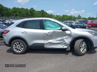2020 Ford Escape SE z VIN 1FMCU9G67LUA85265, wystawiony jako IAAI lot #42389104 z przebiegiem 66 608 mil mil oraz . Historia ofert i sprzedaży dostępna na DreamBid. Obrazek 13.