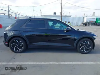 2024 Hyundai Ioniq 5 SEL z VIN KM8KN4DEXRU292121, wystawiony jako IAAI lot #42134633 z przebiegiem 9 266 mil mil oraz . Historia ofert i sprzedaży dostępna na DreamBid. Obrazek 14.