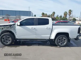 2021 Chevrolet Colorado 2WD Work Truck z VIN 1GCGSBENXM1118310, wystawiony jako IAAI lot #41668804 z przebiegiem 65 295 mil mil oraz . Historia ofert i sprzedaży dostępna na DreamBid. Obrazek 15.