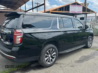 2021 Chevrolet Suburban LS with VIN 1GNSCBKD9MR480205, listed as a Copart auction lot 59422385 with 142,332 mi miles and Salvage title. Bid and sale history available at DreamBid. Image 4.