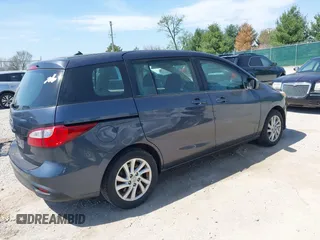 2012 Mazda 5 Sport z VIN JM1CW2BL8C0110989, wystawiony jako IAAI lot #42070091 z przebiegiem 320 397 mil mil oraz . Historia ofert i sprzedaży dostępna na DreamBid. Obrazek 4.