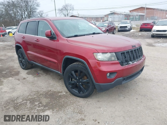 2013 Jeep Grand Cherokee Laredo with VIN 1C4RJEAG4DC573971, listed as a IAAI auction lot 41627288 with 143,256 mi miles. Bid and sale history available at carsss.com. Image 1.