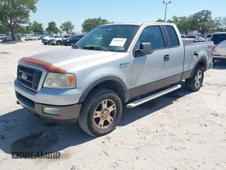 2005 Ford F-150 XLT with VIN 1FTPX14565KC84798, listed as a IAAI auction lot 42064262 with 149,534 mi miles. Bid and sale history available at carsss.com. Image 2.