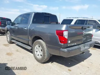 2017 Nissan Titan SV z VIN 1N6AA1E52HN515444, wystawiony jako IAAI lot #42020151 z przebiegiem 156 391 mil mil oraz . Historia ofert i sprzedaży dostępna na DreamBid. Obrazek 3.