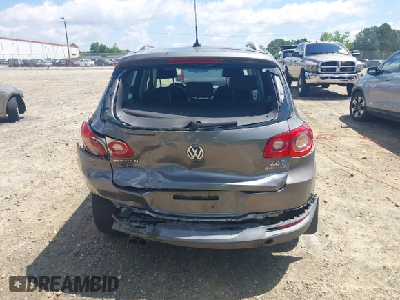 2011 Volkswagen Tiguan SEL z VIN WVGBV7AX5BW512203, wystawiony jako IAAI lot #42273838 z przebiegiem 157 072 mil mil oraz . Historia ofert i sprzedaży dostępna na DreamBid. Obrazek 16.