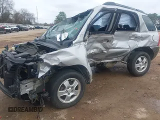2007 Kia Sportage LX with VIN KNDJF724577314160, listed as a IAAI auction lot 41516385 with Not Provided miles. Bid and sale history available at carsss.com. Image 2.