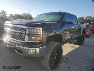 2014 Chevrolet Silverado 1500 LTZ with VIN 1GCUKSECXEF193272, listed as a Copart auction lot 82775984 with 154,131 mi miles and Salvage Title. Bid and sale history available at carsss.com. Image 1.