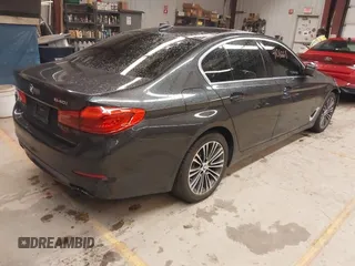 2019 BMW 5 Series 540i xDrive with VIN WBAJE7C53KWW12941, listed as a IAAI auction lot 41016611 with 77,499 mi miles and . Bid and sale history available at DreamBid. Image 4.