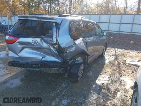 2016 Toyota Sienna XLE with VIN 5TDYK3DC3GS744752, listed as a IAAI auction lot 41077851 with 147,319 mi miles. Bid and sale history available at carsss.com. Image 4.