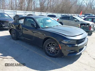 2018 Dodge Charger GT with VIN 2C3CDXJG7JH174641, listed as a IAAI auction lot 41760003 with 74,076 mi miles. Bid and sale history available at carsss.com. Image 1.