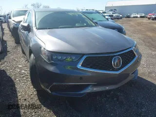 2020 Acura TLX w/Technology Pkg with VIN 19UUB1F52LA012185, listed as a IAAI auction lot 41942957 with 14,677 mi miles. Bid and sale history available at carsss.com. Image 1.