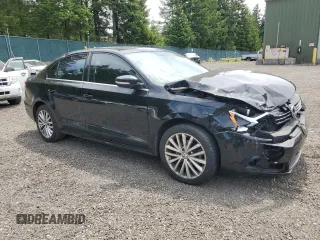 2014 Volkswagen Jetta SEL with VIN 3VWL17AJ2EM440524, listed as a Copart auction lot 61206685 with 104,987 mi miles and Salvage title. Bid and sale history available at DreamBid. Image 4.