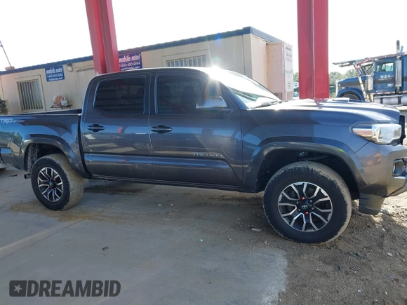 2021 Toyota Tacoma SR5 with VIN 5TFAZ5CN4MX113669, listed as a IAAI auction lot 42468007 with 29,368 mi miles and . Bid and sale history available at DreamBid. Image 14.