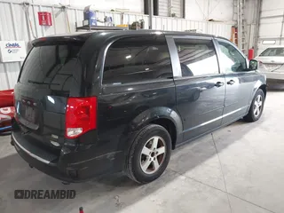 2013 Dodge Grand Caravan SXT with VIN 2C4RDGCG2DR527482, listed as a IAAI auction lot 42199622 with 198,248 mi miles and . Bid and sale history available at DreamBid. Image 4.
