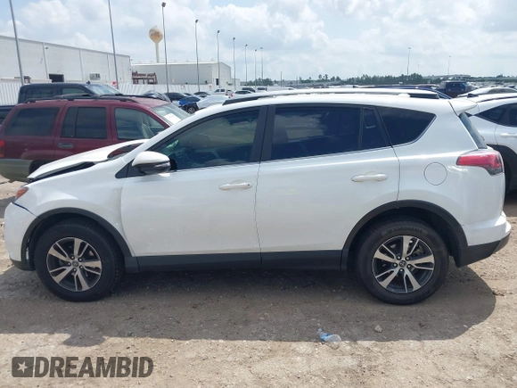 2017 Toyota RAV4 XLE with VIN JTMWFREV8HJ118885, listed as a IAAI auction lot 42097180 with 122,481 mi miles. Bid and sale history available at carsss.com. Image 15.