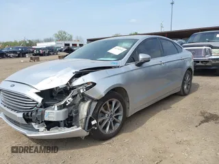 2017 Ford Fusion SE z VIN 3FA6P0HD0HR129175, wystawiony jako IAAI lot #42126532 z przebiegiem 120 424 mil mil oraz . Historia ofert i sprzedaży dostępna na DreamBid. Obrazek 2.