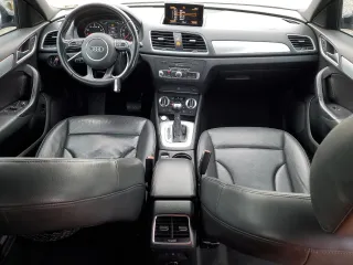 2015 Audi Q3 Premium Plus z VIN WA1BFCFS9FR002457, wystawiony jako Copart lot #87422994 z przebiegiem 135 890 mil mil oraz Szkoda całkowita • Salvage title. Historia ofert i sprzedaży dostępna na DreamBid. Obrazek 8.