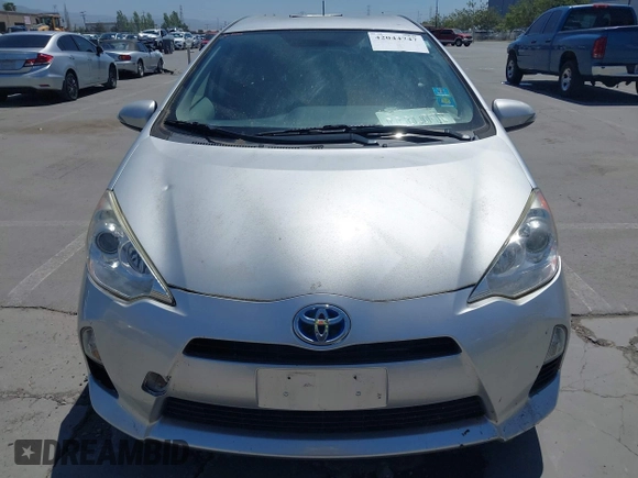 2014 Toyota Prius One with VIN JTDKDTB38E1061202, listed as a IAAI auction lot 42044747 with 133,409 mi miles and . Bid and sale history available at DreamBid. Image 12.
