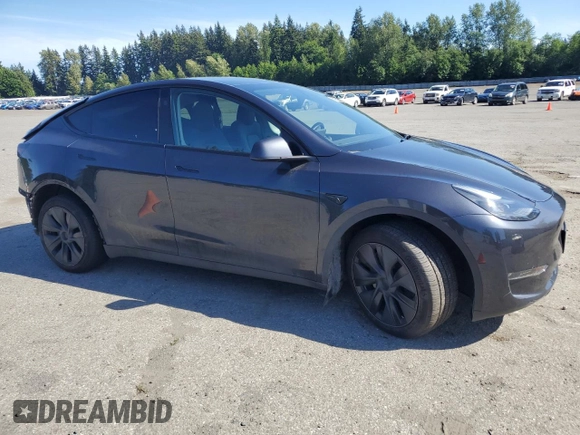 2024 Tesla Model Y Long Range with VIN 7SAYGDEE9RF120729, listed as a Copart auction lot 57360265 with 21,589 mi miles and Salvage title. Bid and sale history available at DreamBid. Image 4.